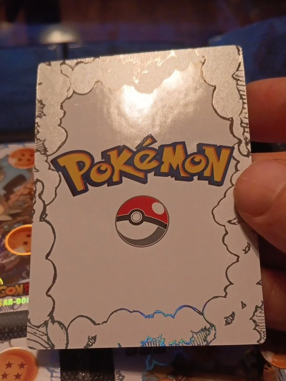 Pokemon Trading Card - Blue Character with Gold Dragon Orbs